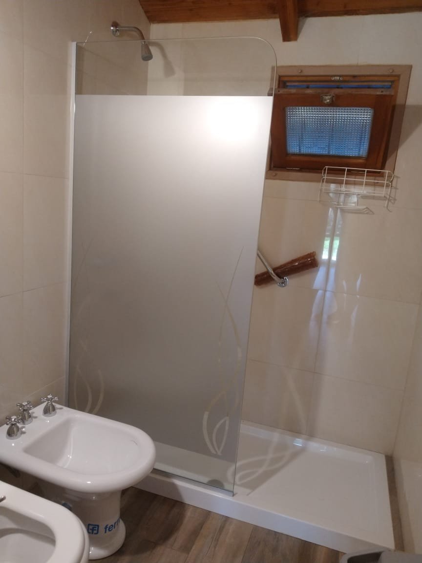 Cabaña con Patio y Parrilla