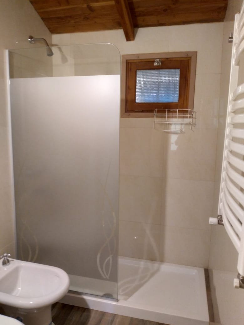 Cabaña con Patio y Parrilla